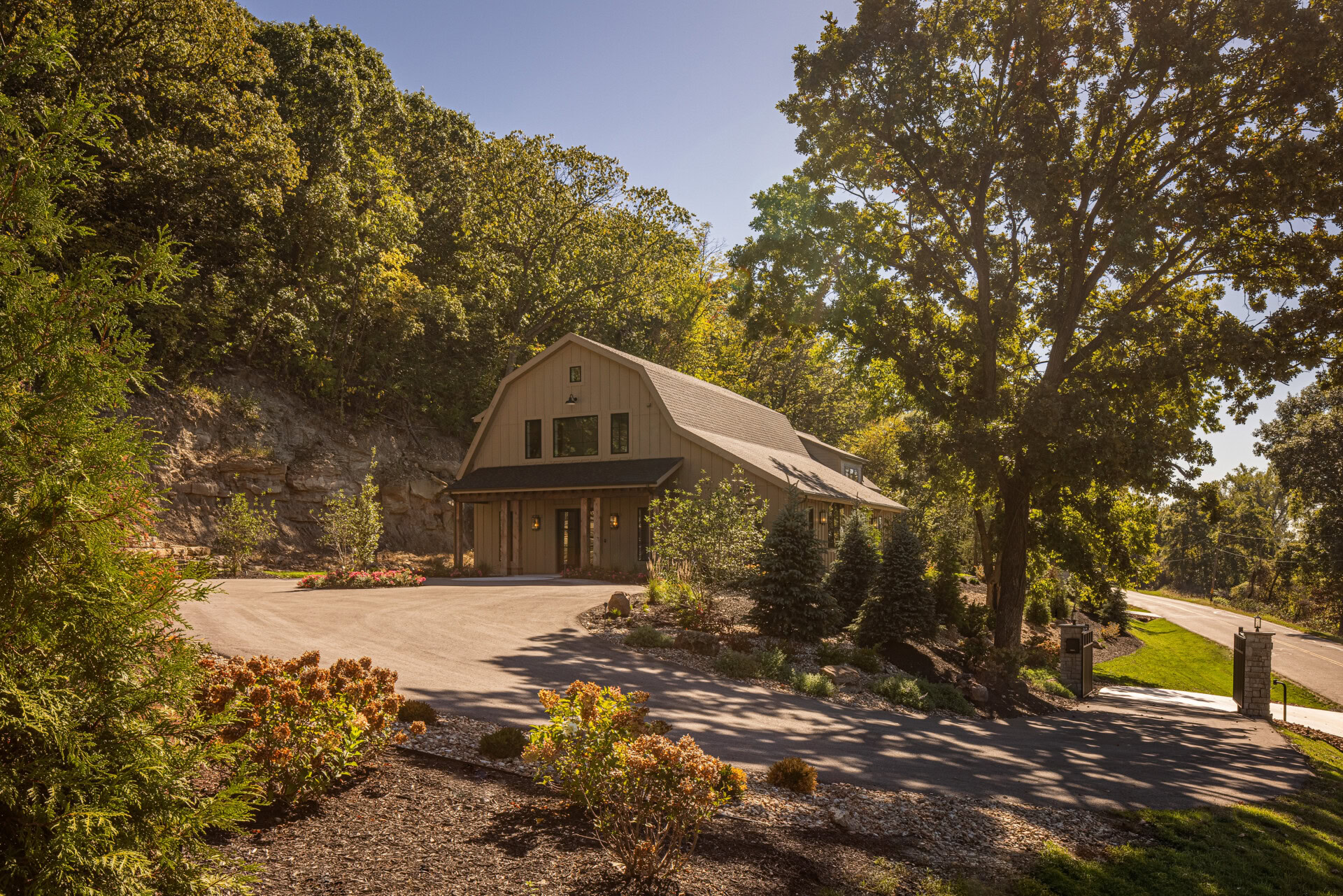 Cardinal Crest Homes Exterior Cardinal Crest Homes: scenic wooded driveway to a modern house.