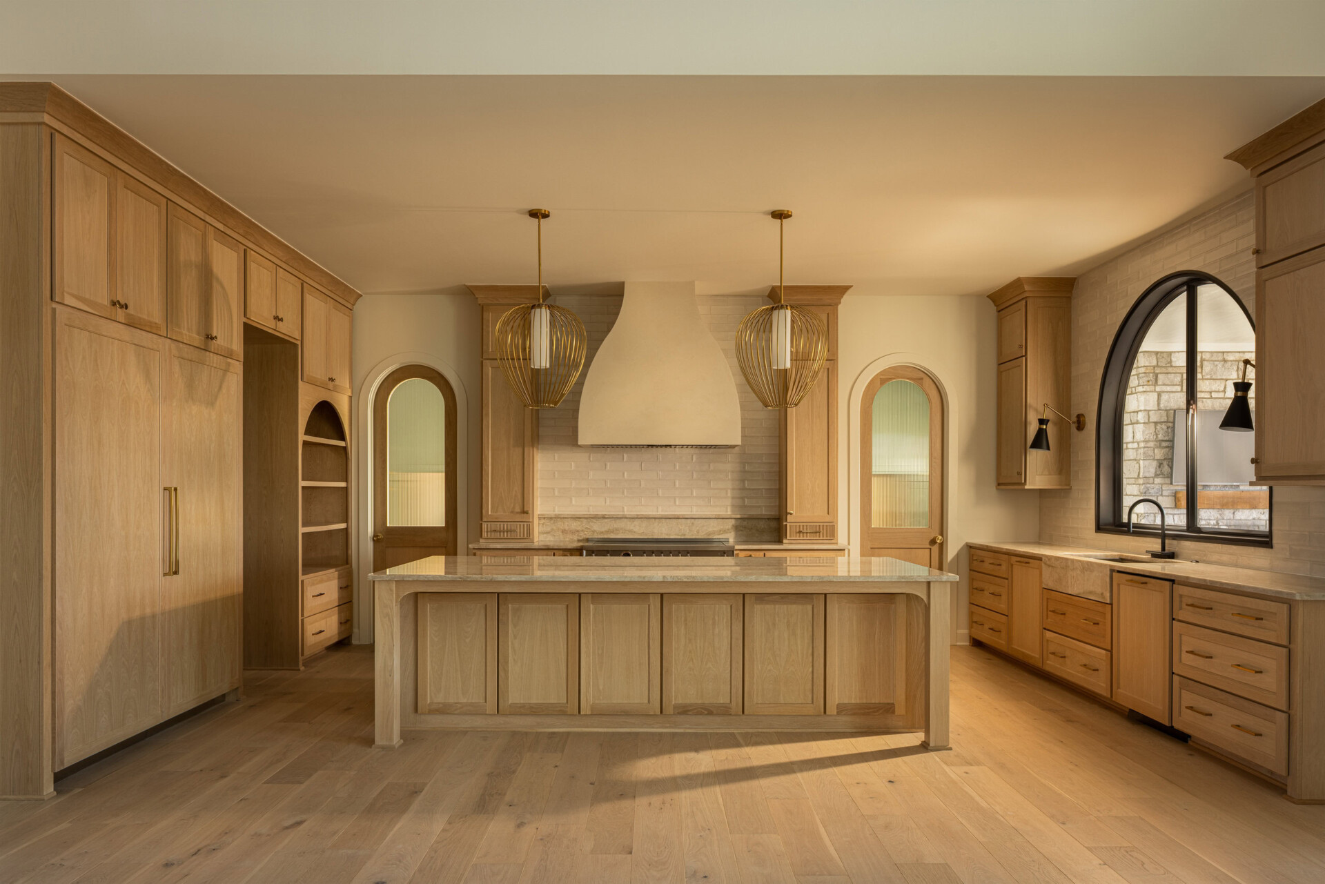 Modern Kitchen Design at Cardinal Crest Homes Spacious modern kitchen with wooden cabinets and island at Cardinal Crest Homes.